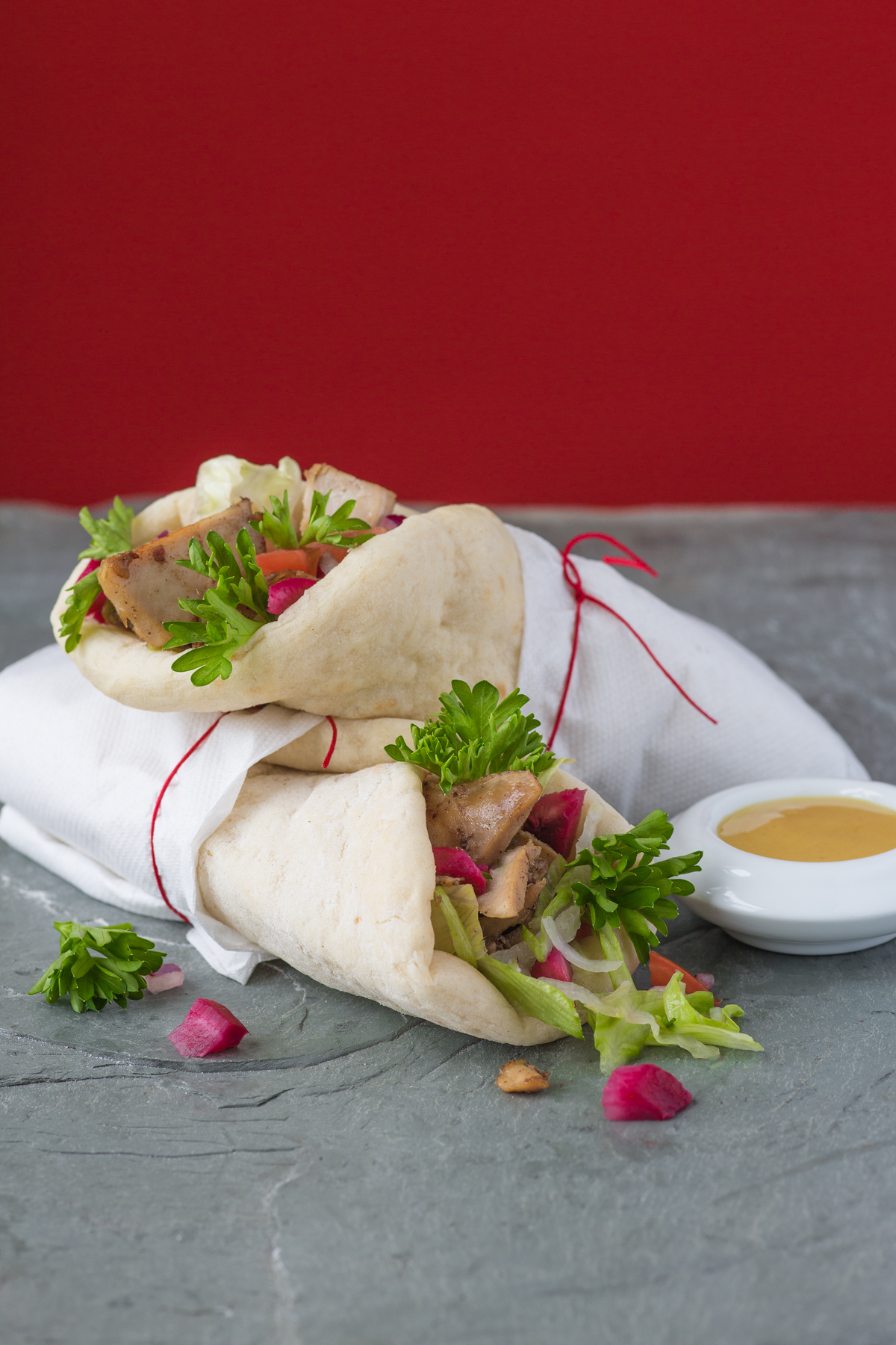 Make a roll, a shawarma or gyro Pita Delight
